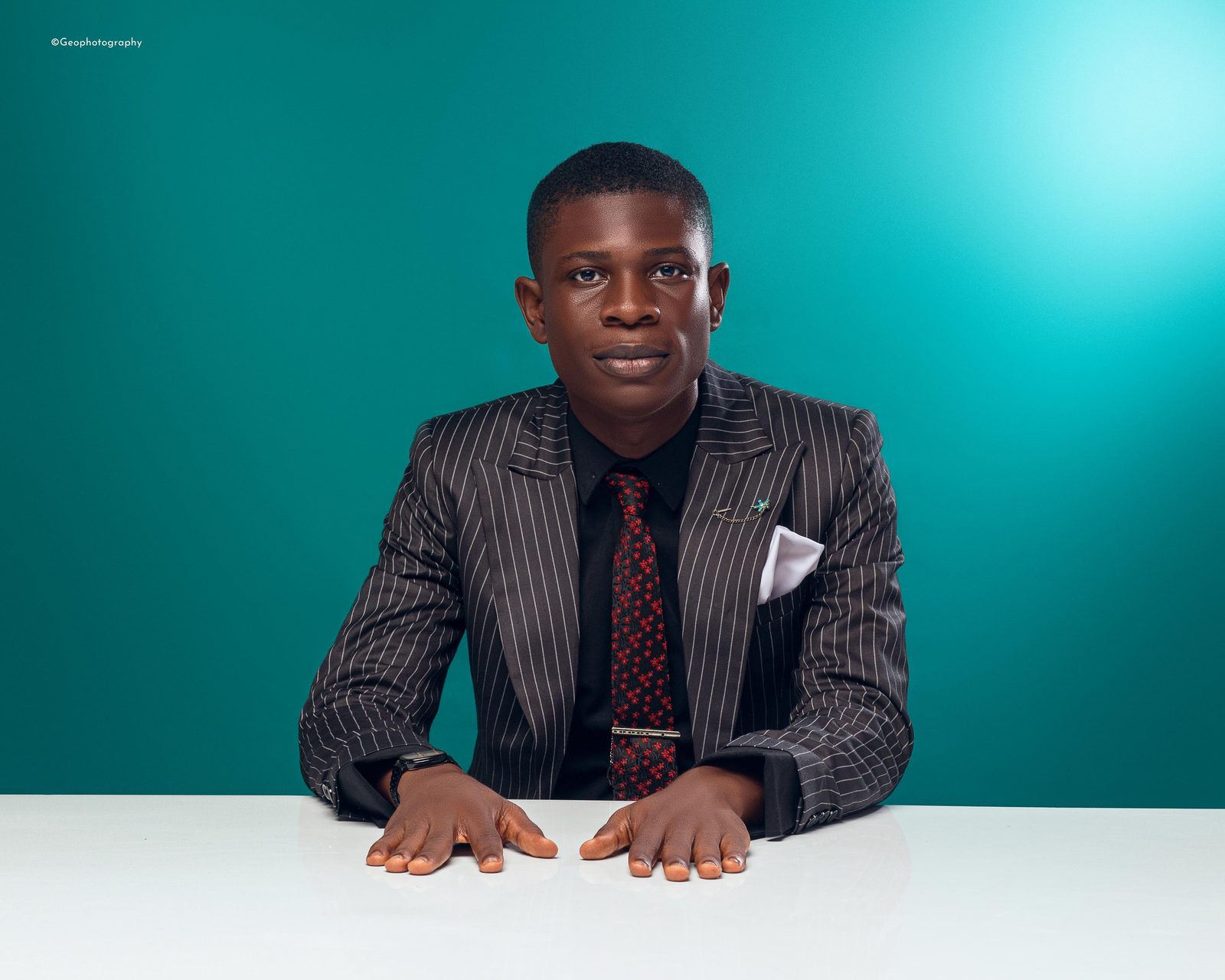 Portrait of Joy Abiola, studio headshot
